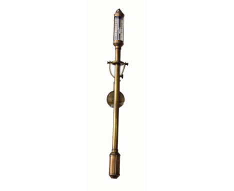 A late 19th/early 20th century Portuguese ships barometer. The brass case with weighted bottom is supported on gimble bracket