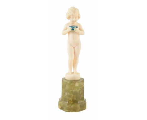 An Art Deco Ivory and Onyx Figure by F. Priess. The carved ivory figure figure of a girl holding a blue painted trinket chest