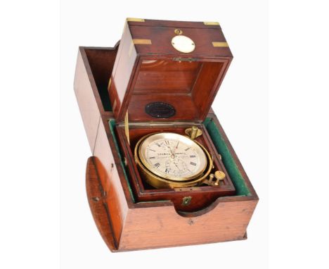 A mid 19th century two-day marine chronometer by Thomas Roberts (34 Strand St. Liverpool). The three tiered, brass-bound maho