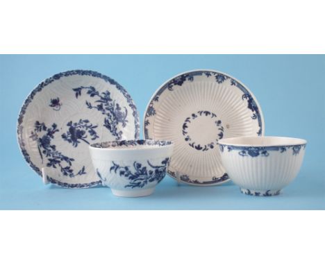 Two Worcester tea bowls and saucers circa 1760, the first with feather moulding and workman's marks to bases, the second with