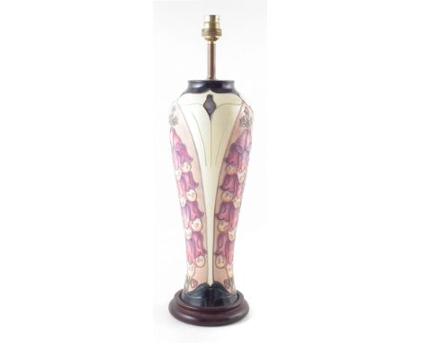 Moorcroft lamp, decorated with foxgloves pattern after Rachel Bishop, with Moorcroft shade, 36cm high excluding fittings. For