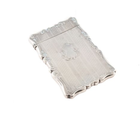 Victorian silver card case , engine turned decoration to to exterior, plain cartouche to one side, shaped scrolling borders, 