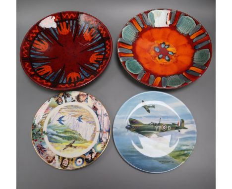 Two Poole Pottery wall chargers, 'Exodus' and 'Volcano' and two limited edition plates, Coalport 'Dawn Patrol' and Royal Doul