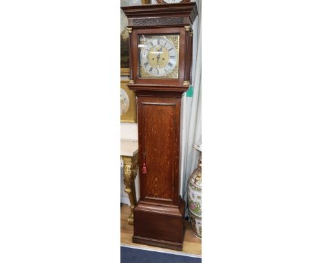 An oak eight-day longcase clock by John Stanton, London, brass dial and silvered Roman chapter ring H.200cm