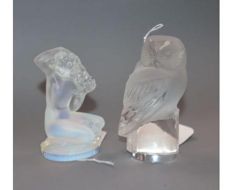 A Lalique frosted glass owl mascot and another of a kneeling nude woman, each with etched signature to base, H 8.5cm (tallest