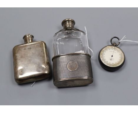 A Victorian engine-turned silver-mounted spirit flask, monogrammed, London 1867, makers Williamson &amp; Horton and two other