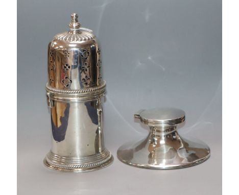 A George V silver lighthouse sugar caster, Chester, 1915 and a silver capstan inkwell.