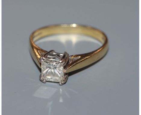A princess-cut solitaire diamond ring, 18ct gold shank, size K.