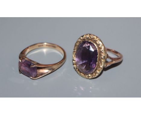 Two 9ct and amethyst set dress rings.