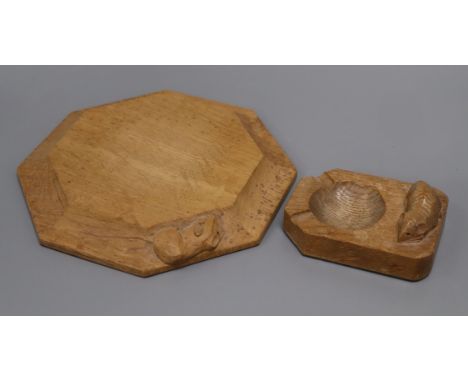 A Robert 'Mouseman' Thompson octagonal oak cheese board/pot stand and an ashtray, each with carved mouse signature