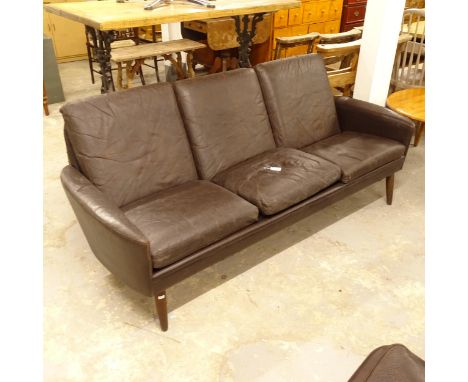 A contemporary brown leather upholstered Danish sofa 