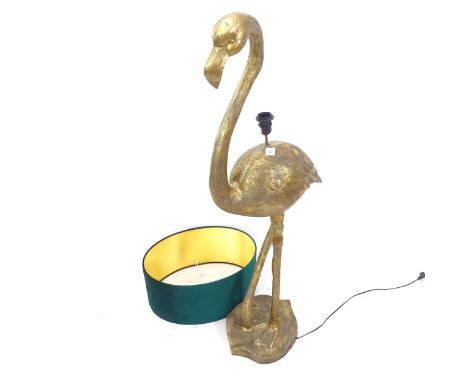 A decorative floor standing gilt composite floor lamp in the form of a flamingo, with green shade, H135cm 