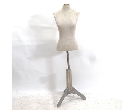 A 20th century half shop mannequin on stand, marked London Cannes, H155cm 