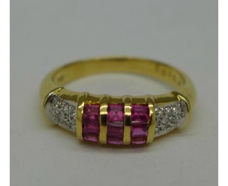 An 18ct gold, ruby and diamond ring, 5g, O