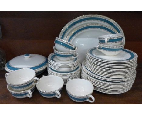 A Crown Ducal dinner service, comprising two serving plates, tureen, eight soup bowls with saucers, ten dinner plates, twelve