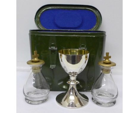 A Government issue communion set, the chalice marked Vanpoulles, Purley, the bottle stops marked KC17249, 1955 and broad arro