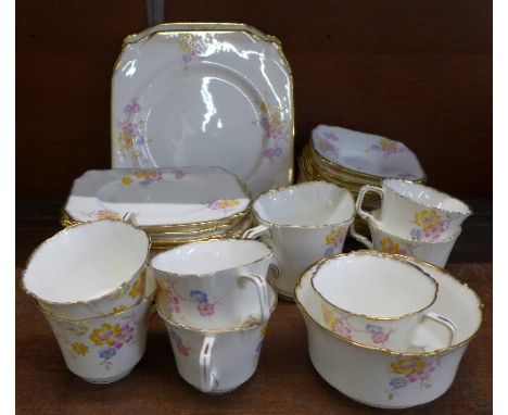 A Paragon Blackthorn china tea set, thirty-four pieces in total including seven cups and eleven saucers