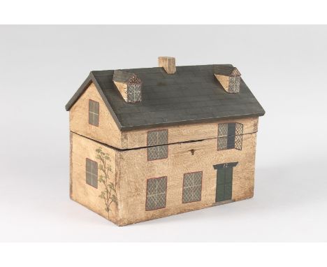 A REPLICA PAINTED WOODEN HOUSE TEA CADDY. 10ins high.