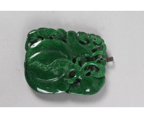 A PIERCED JADE PENDANT with silver top. 3.5ins x 2.5ins.