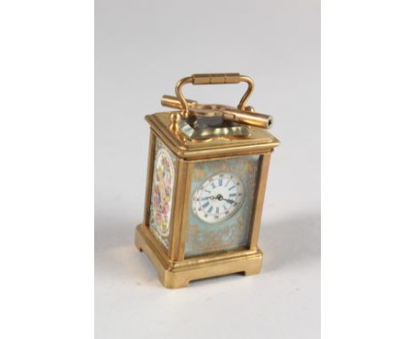 A GOOD MINIATURE SEVRES PORCELAIN TYPE CARRIAGE CLOCK. 2.25ins high.