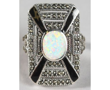 A SILVER OPAL AND ONYZ DECO STYLE RING.