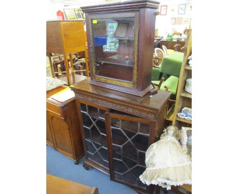 A 19th century mahogany bookcase with two astragal glazed doors enclosing adjustable shelves, raised on bracket feet, togethe