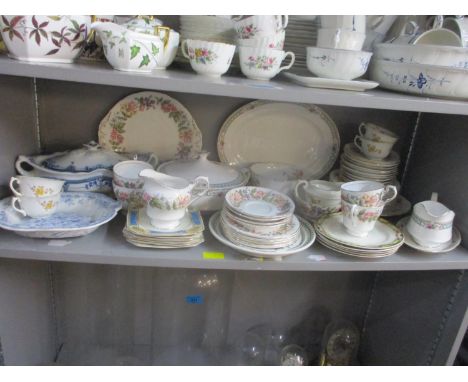 A quantity of ceramic tablewares to include a Royal Doulton Tumbling Leaves part dinner service, a Paragon Country Lane part 