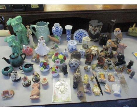 A mixed collection of items to include two Sylvac dogs, a Clarice Cliff jug, a Doulton figure 'Goody Two Shoes', Royal Worces
