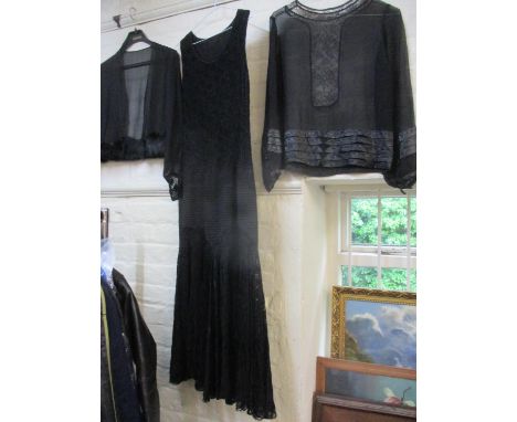 One early 20th century black sheer jacket, an early 20th Century black sheer blouse with lace detail and an early 20th Centur