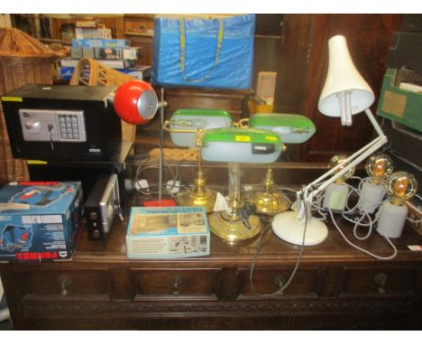 A selection of modern lighting to include three bankers desk lights, a white finished angle poise lamp, and others, two Diall
