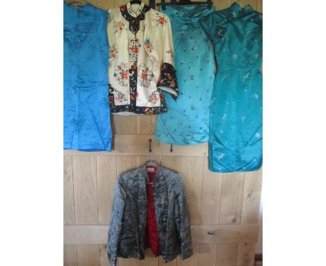 Mid to late 20th century Chinese and Japanese clothing to include a Ying Tai Co padded silk jacket, three dresses, a cream si