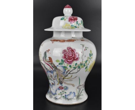 A Chinese 18th century Qianlong period porcelain baluster vase with lid, the body decorated with polychrome famille rose enam