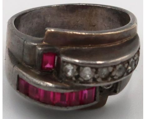 A French deco style dress ring with synthetic ruby's to shoulder. Size L/M 7.2grams 