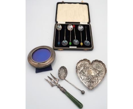 A silver Toasting fork with Jade handle, A circular silver photo frame, a sweetmeat dish with embossed decoration and a set o