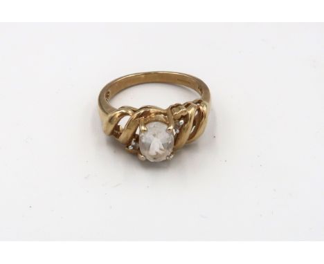 A 9ct gold white stone dress ring. Size O. Weight 3.49 grams. 