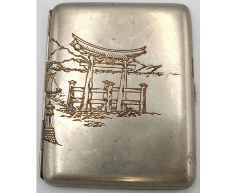A silver Japanese engraved cigarette case circa 1920 with Tori gate design - approx weight 2.42 troy oz 