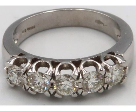 A quality 18ct white gold five stone diamond ring, approx 1.25ct of diamonds, colour approx F/G, VS1, head size approx 20mm x