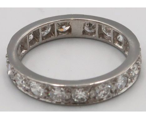 A platinum full diamond eternity ring, approx 2cts of diamonds, head size approx 21mm x 4mm, ring size N/O, diamonds bright a