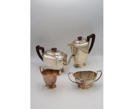A silver H.M. tea and coffee service including Teapot, Coffee pot, Milk and Sugar. Birmingham 1939. 44.47 Troy Oz. 