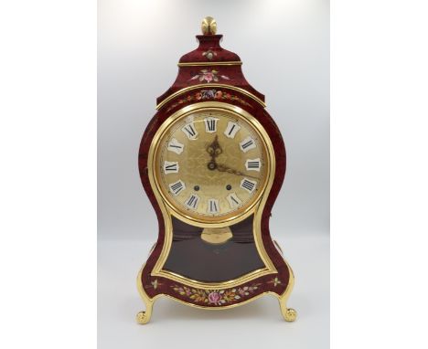 A modern mantle clock with stand Neuchatel clock 
