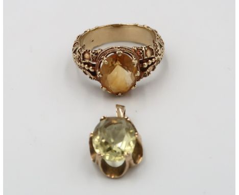 A 9ct gold citrine ring and pendant. Size O. Total weight 6.73 grams. 