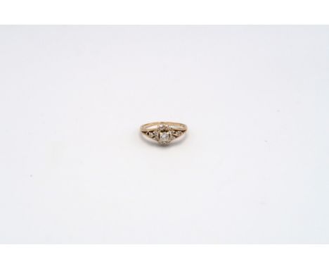 A diamond cluster ring. Estimated total diamond weight 0.50ct. One diamond missing. Stamped 14K. Ring size P. Weight approx 3