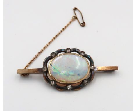 An opal and rose cut diamond bar brooch. Length 52mm. Stamped 9ct. Weight 8.48 grams. 