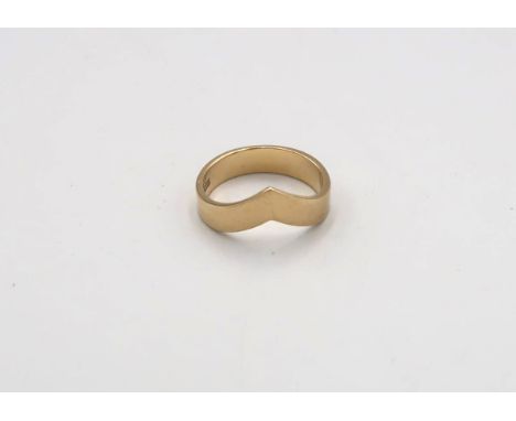 An wishbone yellow gold ring. Size Q 1/2. Stamped 18ct.  approx 6.1 grams 