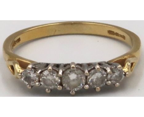 An 18ct Yellow Gold five stone diamond ring 2.8grams Size P/Q. 