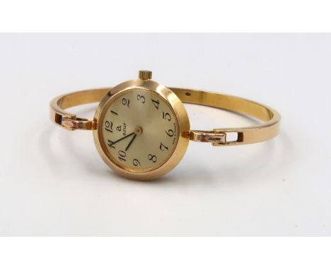 An Azur gold plated bangle watch. 