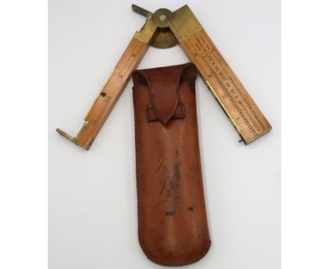 A WWII army engineers' fold up surveying tool with sightings, compass, spirit level, clinometer and rule, in original leather