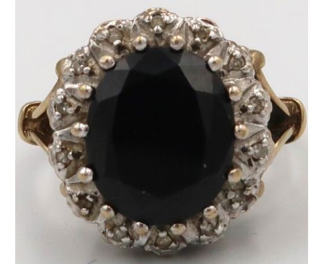 An onyx and diamond unmarked cluster ring Marked 333 8ct. 5.88grams Size M/N 
