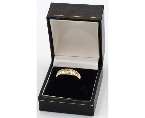 An 18ct yellow gold three stone old cut diamond Edwardian gypsy ring, hallmarked London 1904, head size approx 18mm x 6mm, si
