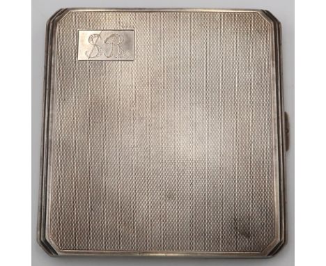 A silver H.M. cigarette case with engine turned decoration, silver gilt interior 3.3 Troy oz 